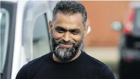  ?? — THE CANADIAN PRESS FILES ?? British Moazzam Begg leaves Belmarsh Prison in south London, after his release in 2014.