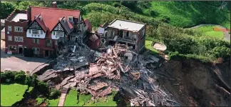  ??  ?? Falling trade: Scarboroug­h’s Holbeck Hall Hotel collapsed in 1993