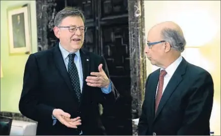  ?? ZIPI / EFE ?? Ximo Puig con Cristóbal Montoro