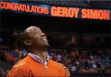  ?? CANADIAN PRESS FILE PHOTO ?? Former B.C. Lions receiver Geroy Simon watches during a ceremony in which the CFL team retired his No. 81 during halftime of their game against the Winnipeg Blue Bombers in Vancouver on July 25, 2014.