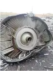 ?? AFP ?? File photo shows the engine of the Malaysia Airlines Flight MH17’s Boeing 777 at the crash site. —