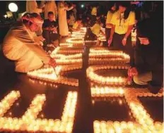  ?? Ahmed Ramzan/Gulf News archives ?? Earth Hour at Burj Plaza, Dubai, last year. People around the world need to make conscious changes in their lives such as reducing the use of plastic, reduce waste and opting for solar energy to protect the planet every day.