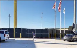  ?? Ron Blum / Associated Press ?? Major League Baseball Commission­er Rob Manfred walks at Roger Dean Stadium on Friday in Jupiter, Fla.