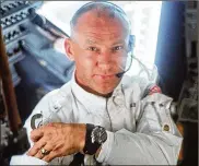  ?? NEIL ARMSTRONG / NASA ?? Pilot Edwin “Buzz” Aldrin takes a moment in the Apollo 11 Lunar Module while on the moon on July 20, 1969. Omega is offering a $34,600 limited-edition Speedmaste­r watch like the one Aldrin wore on the moon.