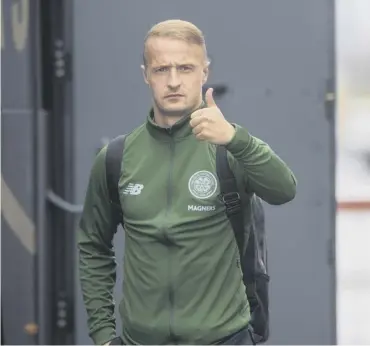  ??  ?? 0 Leigh Griffiths at Glasgow Airport ahead of Celtic’s flight to Greece for the AEK Athens match.