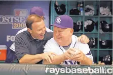  ??  ?? Longtime baseball trainer Ron Porterfiel­d, left, a graduate of St. Michael’s High, is shown here with the late Don Zimmer, legendary player, coach and manager, while both were with the Tampa Bay Rays.