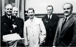  ??  ?? Soviet leader Joseph Stalin (centre) at the signing of the August 23,1939 pact. Also in the picture were German Foreign Minister Ribbentrop (left) and Soviet Foreign Minister Molotov (extreme right)
