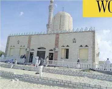  ?? STRINGER / AFP / GETTY IMAGES ?? The Rawda mosque, in North Sinai, Egypt, was the scene of a gun and bombing attack on Friday that killed more than 200 worshipper­s who had gathered for prayers.