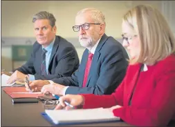  ??  ?? Jeremy Corbyn flanked by Keir Starmer and Rebecca LongBailey