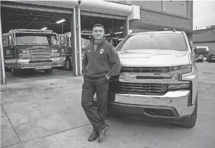  ??  ?? Sgt. Miles Bracali of the Ferndale ( Mich.) Fire Department with his new 2020 Chevrolet Silverado on Jan. 14, 2019, that was purchased with the help of personal dealer Brian Carroll Automotive Group.