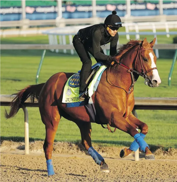  ?? — AP ?? Kentucky Derby favourite Justify trains on Tuesday at Churchill Downs ahead of the 144th Run for the Roses on Saturday. Justify, who is 3-0 in his brief career, didn’t race as a two-year-old. No horse since Apollo in 1882 has won the Derby after not...