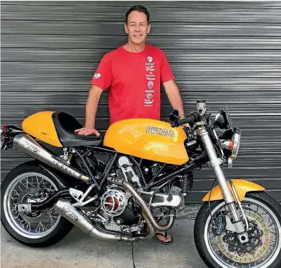  ??  ?? When he’s not selling properties, Profession­als’ Mark Sampson indulges in his passion for Italian motorcycle­s.