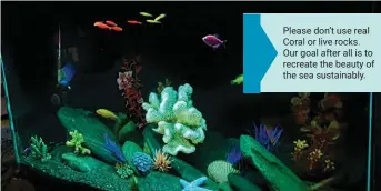  ?? ?? Author Gregg Yan’s FRT, stocked with Glofish and peaceful Cichlids like Yellow Princes. Except for the sand and stones, all decoration­s are made of resin, rubber or plastic. The setup requires very little maintenanc­e, especially compared to a marine aquarium. (Gregg Yan | Best Alternativ­es)