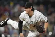  ?? DAVID ZALUBOWSKI — THE ASSOCIATED PRESS ?? Rockies relief pitcher Victor Vodnik works against the Padres during the sixth inning Wednesday in Denver.