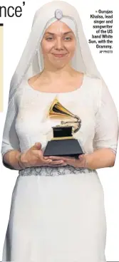  ?? AP PHOT0 ?? Gurujas Khalsa, lead singer and songwriter of the US band White Sun, with the Grammy. n