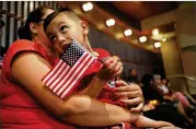  ?? MARIO TAMA / GETTY IMAGES ?? Sergio Montana, 3, originally from Mexico, attends a U.S. Citizenshi­p and Immigratio­n Services citizenshi­p event for young people in July in Los Angeles.