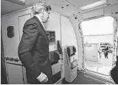  ?? JACQUELYN MARTIN/AP ?? Secretary of State John Kerry walks out of his plane upon arrival in Cairo, Egypt, on Saturday.