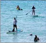  ?? SUN QING / FOR CHINA DAILY ?? Tourists sail on the sea of Hainan’s Sanya during the recent May Day holiday.