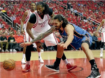  ?? PHOTO: USA TODAY SPORTS ?? Houston Rockets centre Nene Hilario (42) and Oklahoma City Thunder forward Steven Adams (24) reach for a loose ball in the first quarter of game five of the first round of the NBA Playoffs at Toyota Center yesterday.