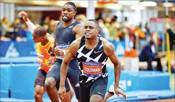  ?? AFP ?? US runner Christian Coleman (right) crosses the finish line to win the men’s 60m dash event at the 114th Millrose Games in New York on January 29.