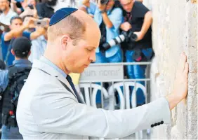  ?? Photo / Getty Images ?? Prince William prays at the Western Wall in Jerusalem.