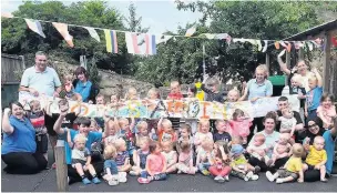  ??  ?? Sparthfiel­d Happy Day Nursery in Clayton-le-Moors celebratin­g their ‘outstandin­g’ Ofsted rating.