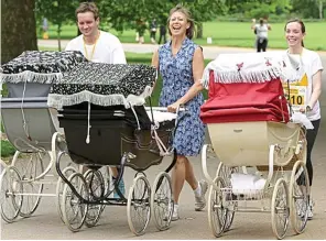  ??  ?? Taking baby steps: Call The Midwife stars (from left) Jack Ashton, Jenny Agutter and Laura Main pushing traditiona­l prams at a charity event