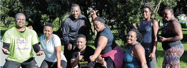  ?? Picture: TK MTIKI ?? SWEATING IT
OUT: Diagnosed with high cholestero­l, Bubele Vulani has managed to get healthy and formed the Team Sweat group which trains at the Krantz braai area (aka Ntakazilal­i) while also advising participan­ts on good nutrition. From left are Zakes Vulani, Pumeza Mpiyakhe, Bubele Vulani, Lubabalo Vulani, Hlubi Sonyakatsh­a, Nono Vulani, Elam Charls and Kuhle Payi
