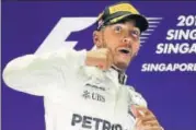  ?? AP ?? Mercedes’ Lewis Hamilton expects strong response from Ferrari.