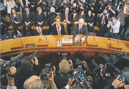  ?? Chip Somodevill­a, Getty Images ?? Marie Yovanovitc­h, former U.S. ambassador to Ukraine, sits next to her attorney, Larry Robbins, before testifying to the House Intelligen­ce Committee on Friday in the Longworth House Office Building in Washington.