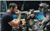  ??  ?? Hugh Jackman coaches a robot in Real Steel.