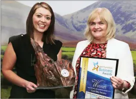  ??  ?? Right: IRD Duhallow chairperso­n Anna Maria Bourke presenting the Best Women-Led award to Erin Geraghty of Cork Baby Sensory.