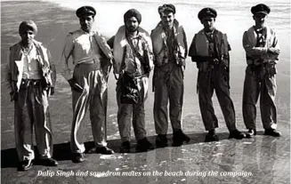  ??  ?? Dalip Singh and squadron mates on the beach during the campaign.