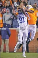  ?? PHOTO BY PATRICK MURPHY-RACEY ?? Tennessee’s Marquill Osborne (3) breaks up a pass intended for Kentucky’s Isaiah Epps (81) in the third quarter Saturday at Neyland Stadium. Osborne intercepte­d two passes in the Vols’ 24-7 victory.