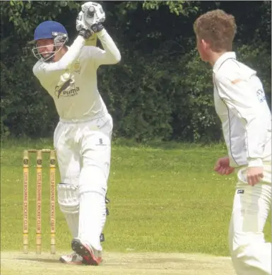  ?? Pictures: Chris Davey FM4807832, above; FM4807802, right ?? Déjà vu for Stone in Oxney opening bowler Henry Pelling-smith as brothers Sully Gould, above, and Buzz Gould get Littlebour­ne off to a flying start on Sunday. The visitors, though, had the last laugh chasing down 266 to triumph