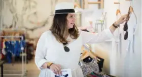  ?? NICK KOZAK FOR THE TORONTO STAR ?? Interior designer Jennifer Ferreira registered for her upcoming baby shower at a local Toronto boutique, but she has no plans to post photos or videos of her gifts.