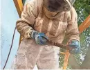  ?? VIDEO PROVIDED BY PAUL SIFTON, CO-OWNER OF BEE FRIENDS FARMS ?? Bee Friends Farms removed tens of thousands of bees from the outside of the Florida Theatre on April 28.