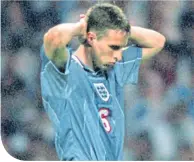  ??  ?? Gareth Southgate after his missed penalty against Germany at Euro 96