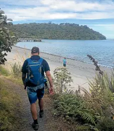  ?? Tom Mulholland ?? A break in the weather allows for a hike around Stewart Island.