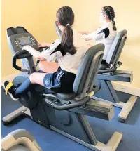  ??  ?? Hyndburn Academy pupils exercising in the fitness suite as part of Tokyo Games-inspired Challenge 2020