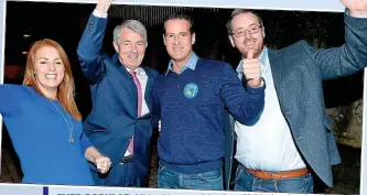  ??  ?? EvEr-popular: Michael Lowry celebratin­g with his daughter Lorraine and sons Jonathan and Michael at the Thurles count after being elected for Tipp