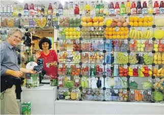  ?? TRISH FEASTER ?? Grocery stores in St. Petersburg, Russia, like many in Europe, are chock full of colourful drinks, pickled goodies, fresh produce and friendly locals, making them the perfect place to assimilate.