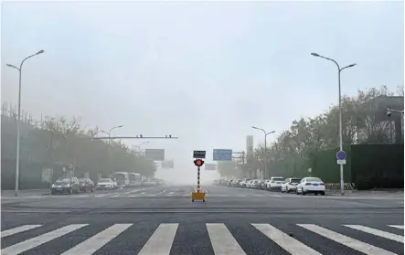  ?? — Bloomberg ?? Ghost town: beijing’s streets are empty and grocery delivery services are stretched as rising Covid-19 cases trigger lockdown-like restrictio­ns across swathes of the Chinese capital.