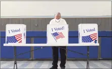  ?? Tyler Sizemore / Hearst Connecticu­t Media ?? Stamford’s Robert Accurso gets ready to vote at the Recreation Star Center on Primary Election Day in Stamford on Tuesday.