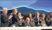  ?? REUTERS ?? Delegates applaud after COP27 president Sameh Shoukry’s statement at the closing plenary in Egypt on Sunday.