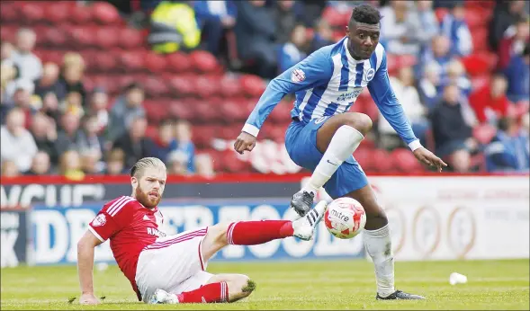  ?? PICTURES: Action Images ?? DUEL: Adam Clayton of Middlesbro­ugh, left, and Rohan Ince of Brighton in action