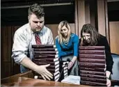  ?? JIM LO SCALZO/EPA ?? Senate staffers stack copies of tax code informatio­n for a hearing by the Senate Finance Committee on Monday.