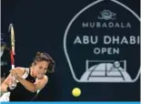  ?? — AFP ?? ABU DHABI: Russia’s Daria Kasatkina hits a return against Sorana Cirstea of Romania during the womLU»Z ZPUNSLZ X\HY[LY ÄUHS TH[JO H[ [OL 4\IHKHSH (I\ Dhabi Open tennis tournament in Abu Dhabi.