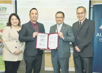  ?? ?? (From left) Farm Price executive director Liew, Tiong, AIS chief executive officer Rizal IL-Ehzan Fadil Azim, and senior vice president, head of Corporate Finance Tee Kok Wah pose for a group photo.