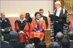  ?? DU XIAOYING/ CHINA DAILY ?? Vice-Premier Liu Yandong receives an honorary doctor of letters degree from the University of Edinburgh in Scotland on Tuesday.